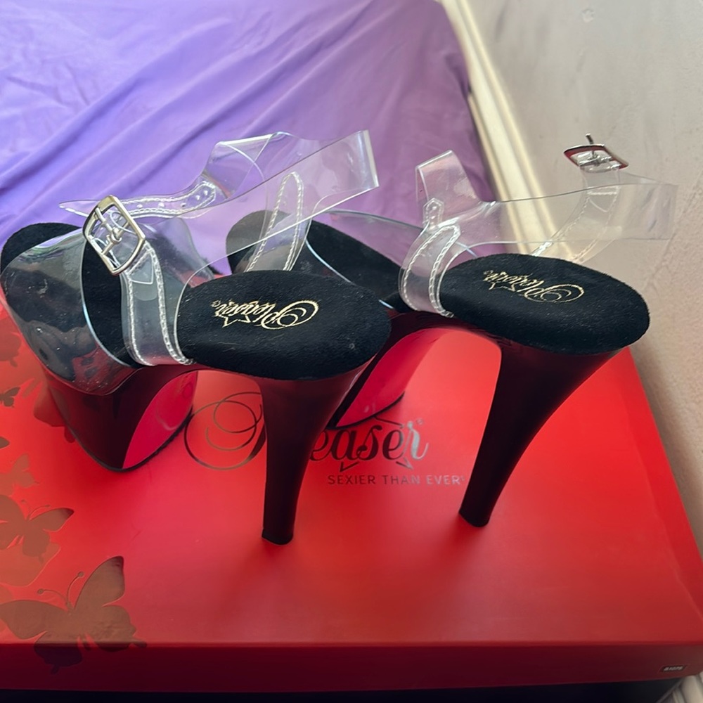 Pleasers brand stripper heels, size 10 women’s. Black and hot pink underneath.